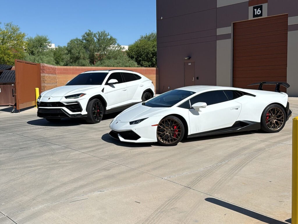 Lamborghini Urus and Huracán parked in Scottsdale, showcasing luxury SUV and supercar design, emphasizing Apex Exotic Rentals' premium vehicle offerings.