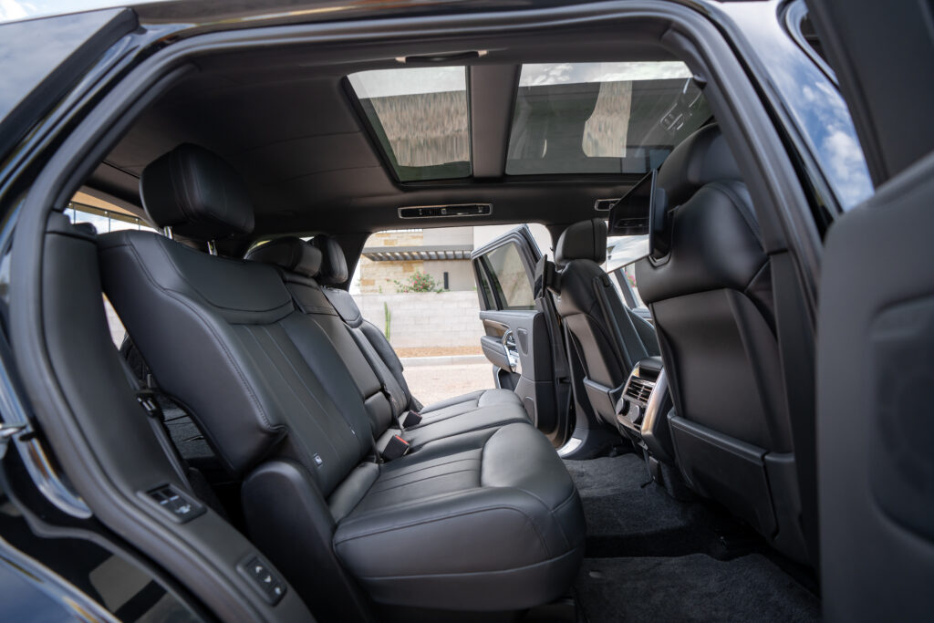 Black Range Rover LWB Autobiography rental in Scottsdale, rear seats and panoramic roof interior view