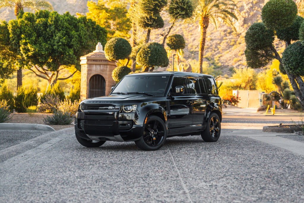 Black Land Rover Defender 110 V8 rental in Scottsdale, front three-quarter view