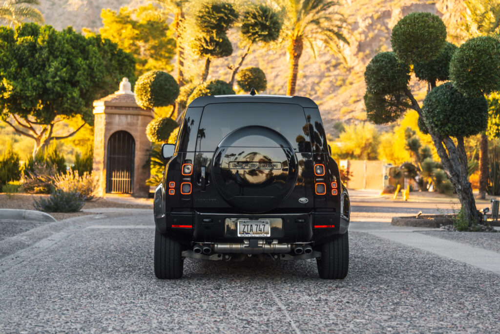 Black Land Rover Defender 110 V8 rental in Scottsdale, rear view