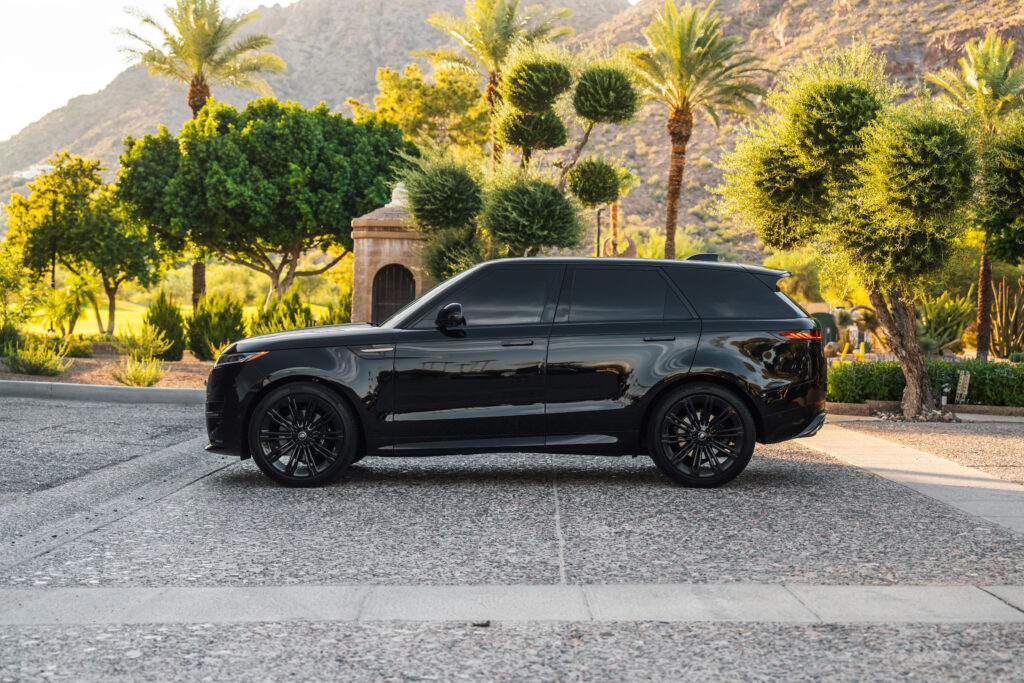 Black 2024 Range Rover Sport rental in Scottsdale, side profile view