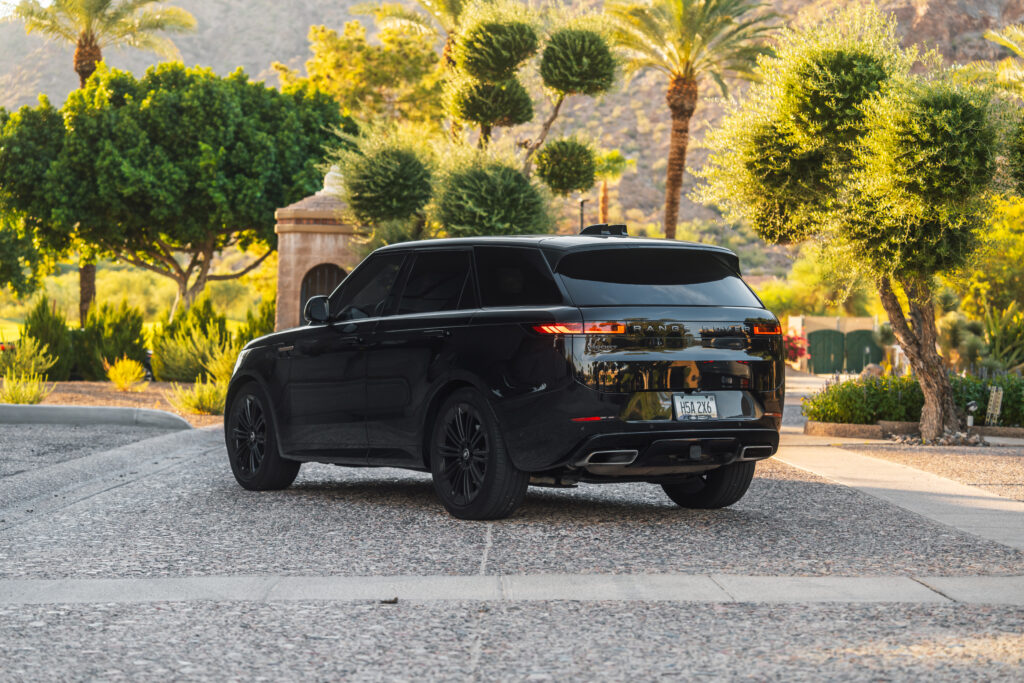 Black 2024 Range Rover Sport rental in Scottsdale, rear three-quarter view
