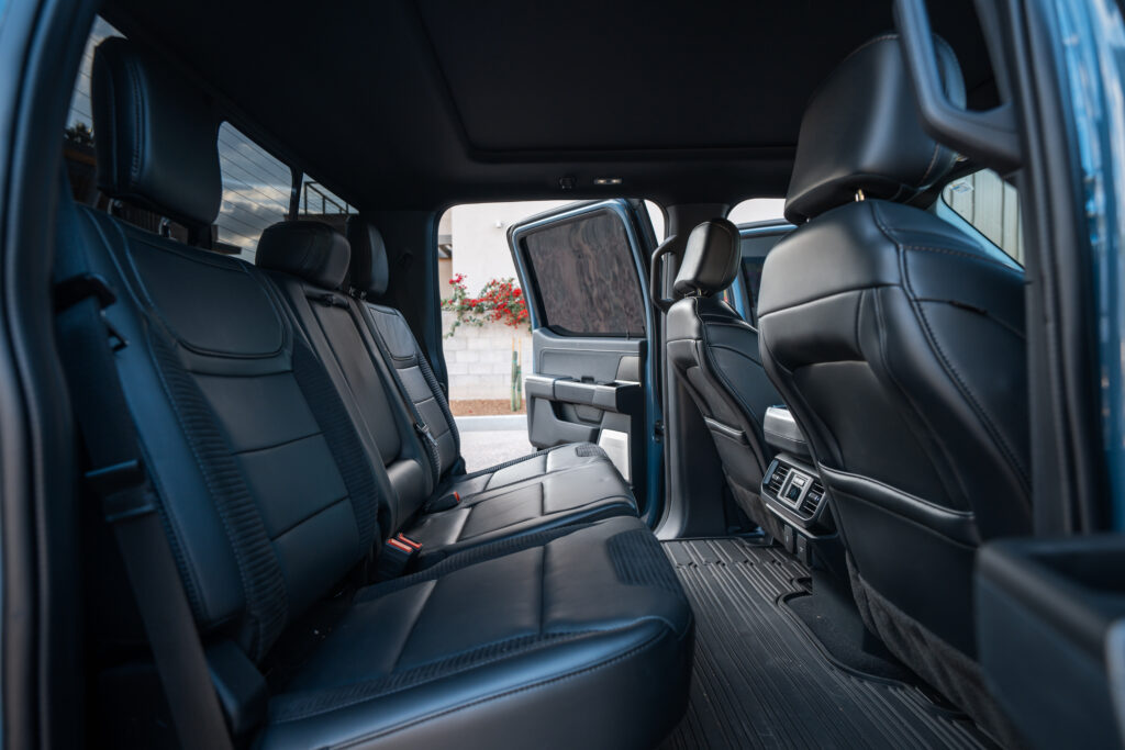 Gray Ford F-150 Raptor rental in Scottsdale, rear seats interior view