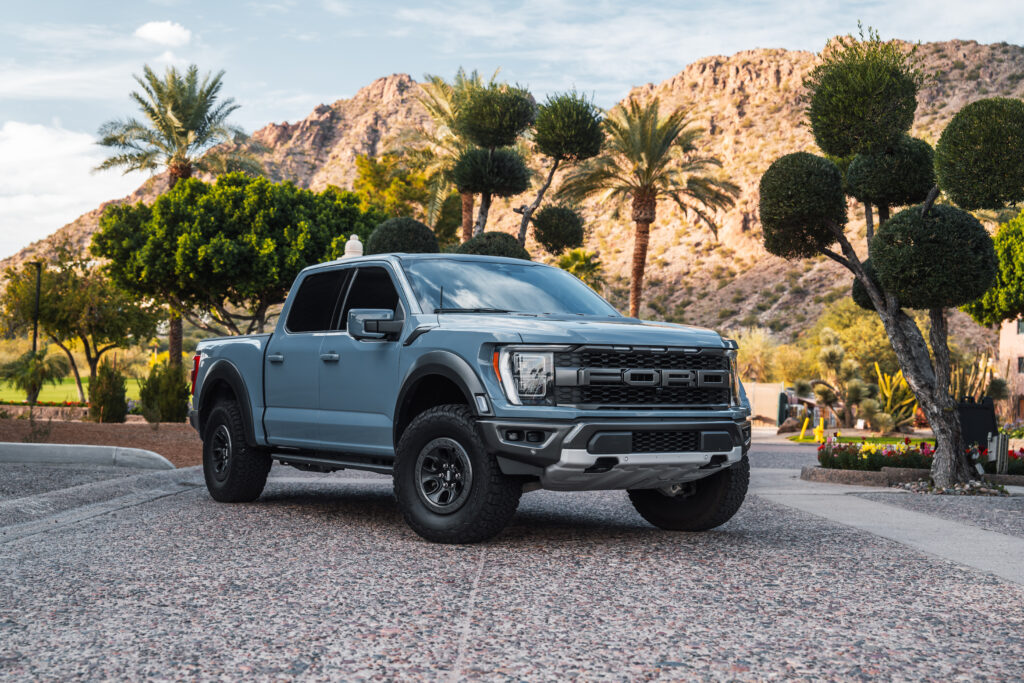 Gray Ford F-150 Raptor rental in Scottsdale, front three-quarter view