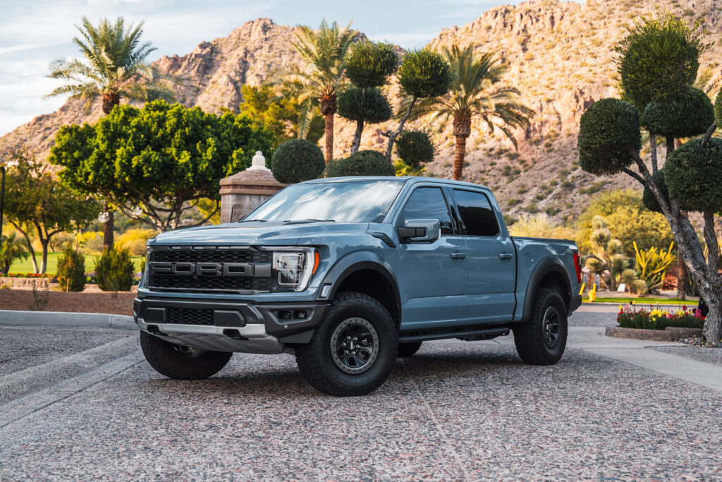 Gray Ford F-150 Raptor rental in Scottsdale, front three-quarter view